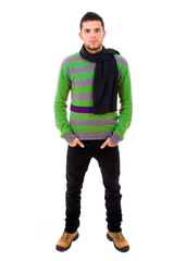 Naklejka premium Full body of young man dressed with winter clothes, isolated on