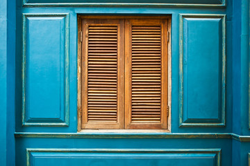 green wooden and window