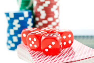 poker chips, cards and red dice cubes