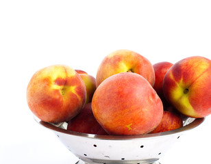 peaches on bowl