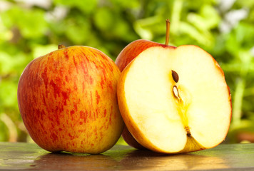 red apple on metal