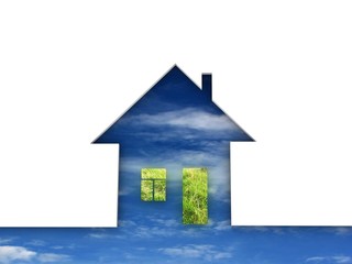 Obraz na płótnie Canvas Eco house metaphor. House with grass and sky.