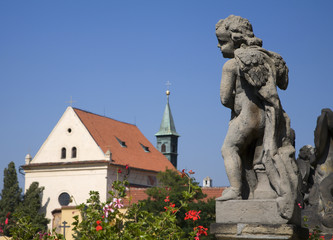 Fototapeta na wymiar Praga - barokowy anioł przez Loreto kościoła