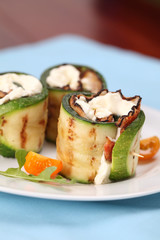 Zucchini rolls with pepper crusted bacon and cheese
