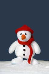 cute standing snowman with red bonnet
