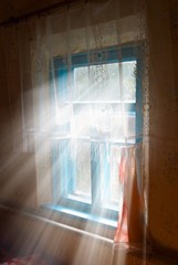 rays of sun pushing through a window