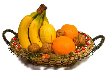 heap of fruits in a small beautiful backet