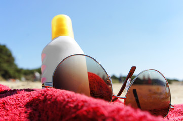 beach book sunglasses suncream towel 2