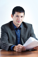 Young businessman with documents