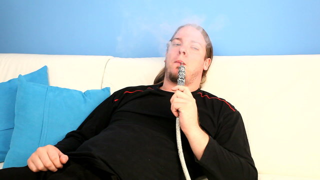 young man smoking hookah