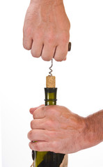 pulling corkscrew cork from the bottle