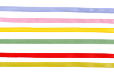 a set of silk ribbons on a white background