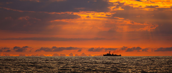 Fototapeta premium Navy ship on sunset