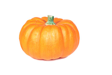 Pumpkin on white background close-up.