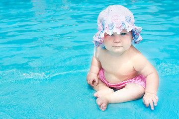 cute little girl in waterpool