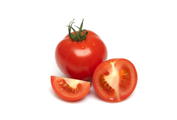 Red Tomatoes and slice on a white background
