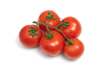 Bunch of tomatoes isolated on white