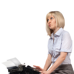 Business woman with vintage typing machine on white
