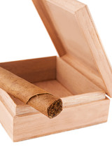 One left cigar in wooden box