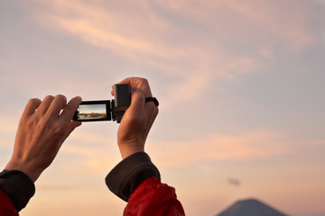 People hand taking picture