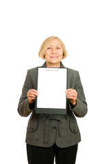 Portrait of a happy senior woman holding clipboard