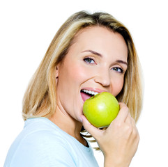 Young happy woman with green apple