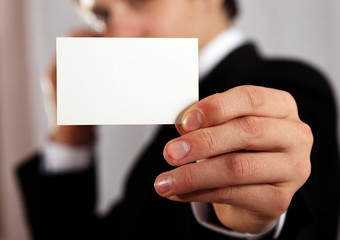 presenting blank business card