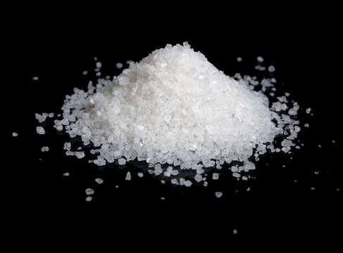 Heap Of Salt Isolated On Black