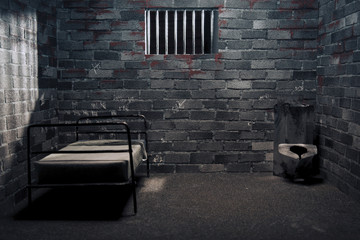 Dark prison cell at night - obrazy, fototapety, plakaty