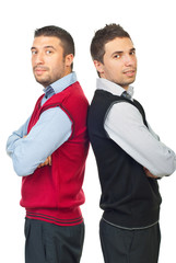 Two businessmen in shirts and vests