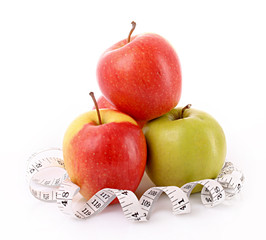 Apples and a measure tape, diet concept