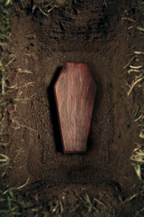 coffin or tomb at graveyard - 26534124