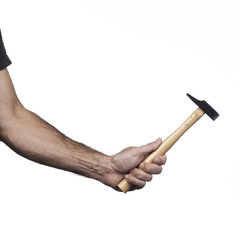 Hand holding a hammer