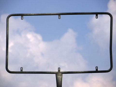 Advertising sign and clouds