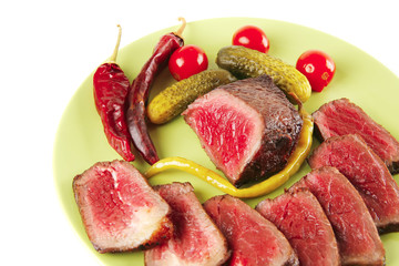 meat and vegetables with peppers