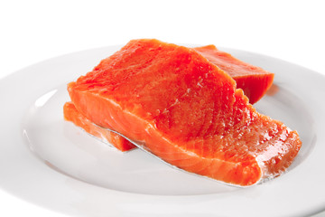 fresh smoked salmon on white plate