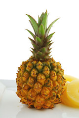 fresh raw pineapple and slices