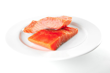 fresh smoked salmon on white plate