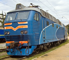old locomotive on railway station