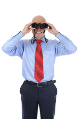 Businessman looking through binoculars