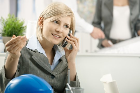 Businesswoman on phone in office