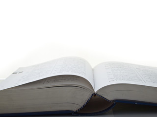 Opened book with white background