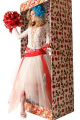 Obraz premium The doll in a gift box.
