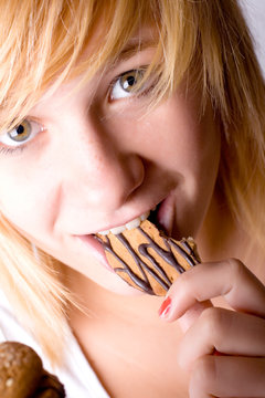 Woman Eating Chocolate Chip Cookies