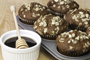 Fresh honey and oat bran muffins