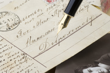 Retro postcard and gold pen