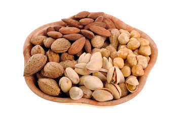 different kernels in a bowl on a white background