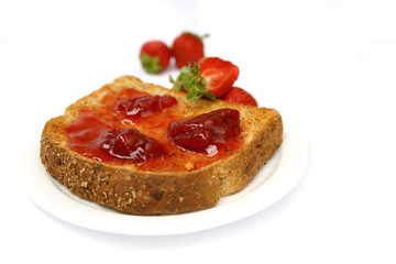 Strawberry jam on toast