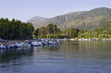 River Mingardo with moored boats, Italy