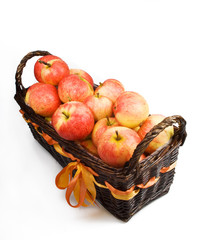 Basket with apples isolated on the white